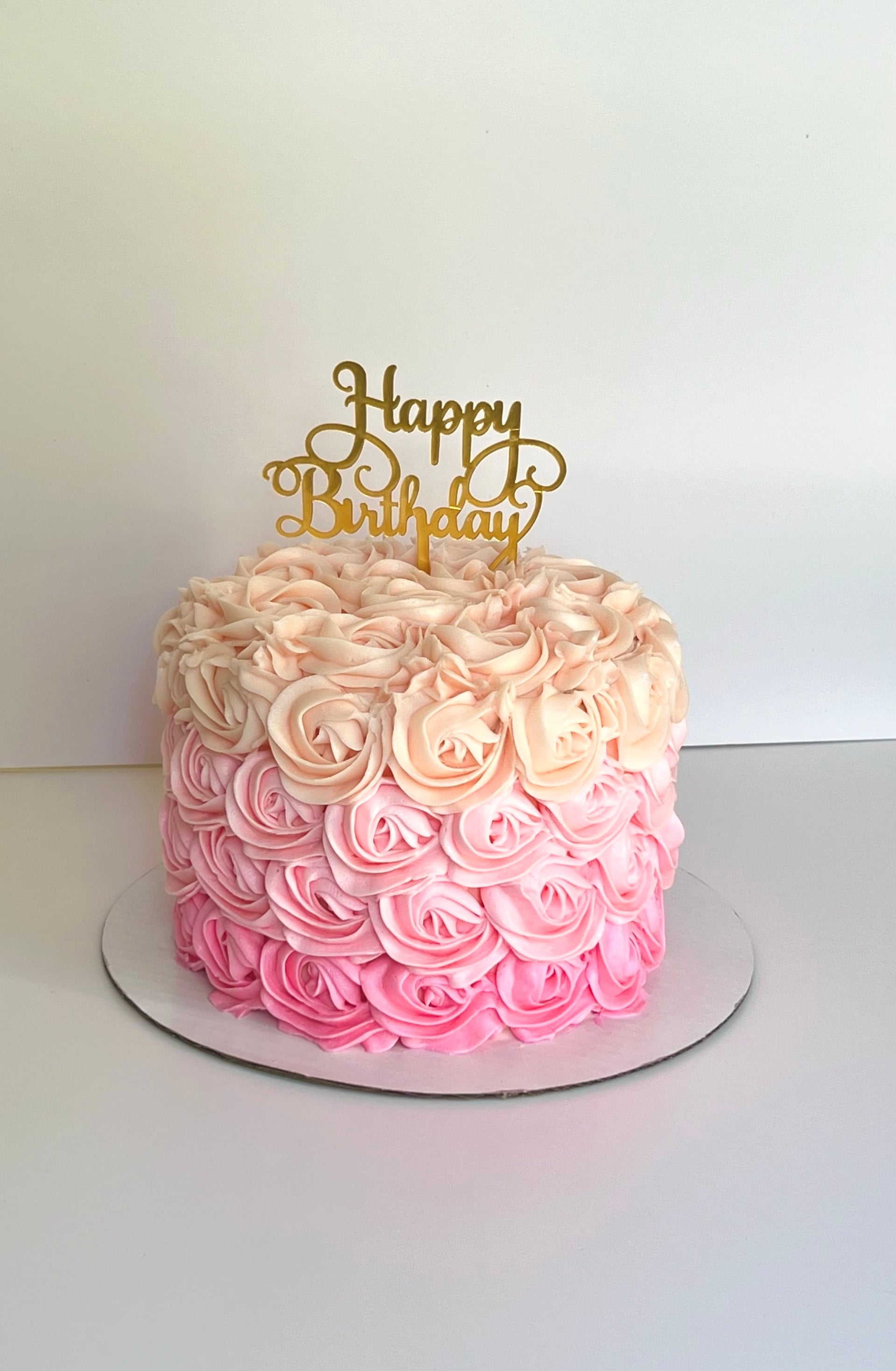 flower tiered birthday cake - custom eggless birthday cake by Cakes by Ashni