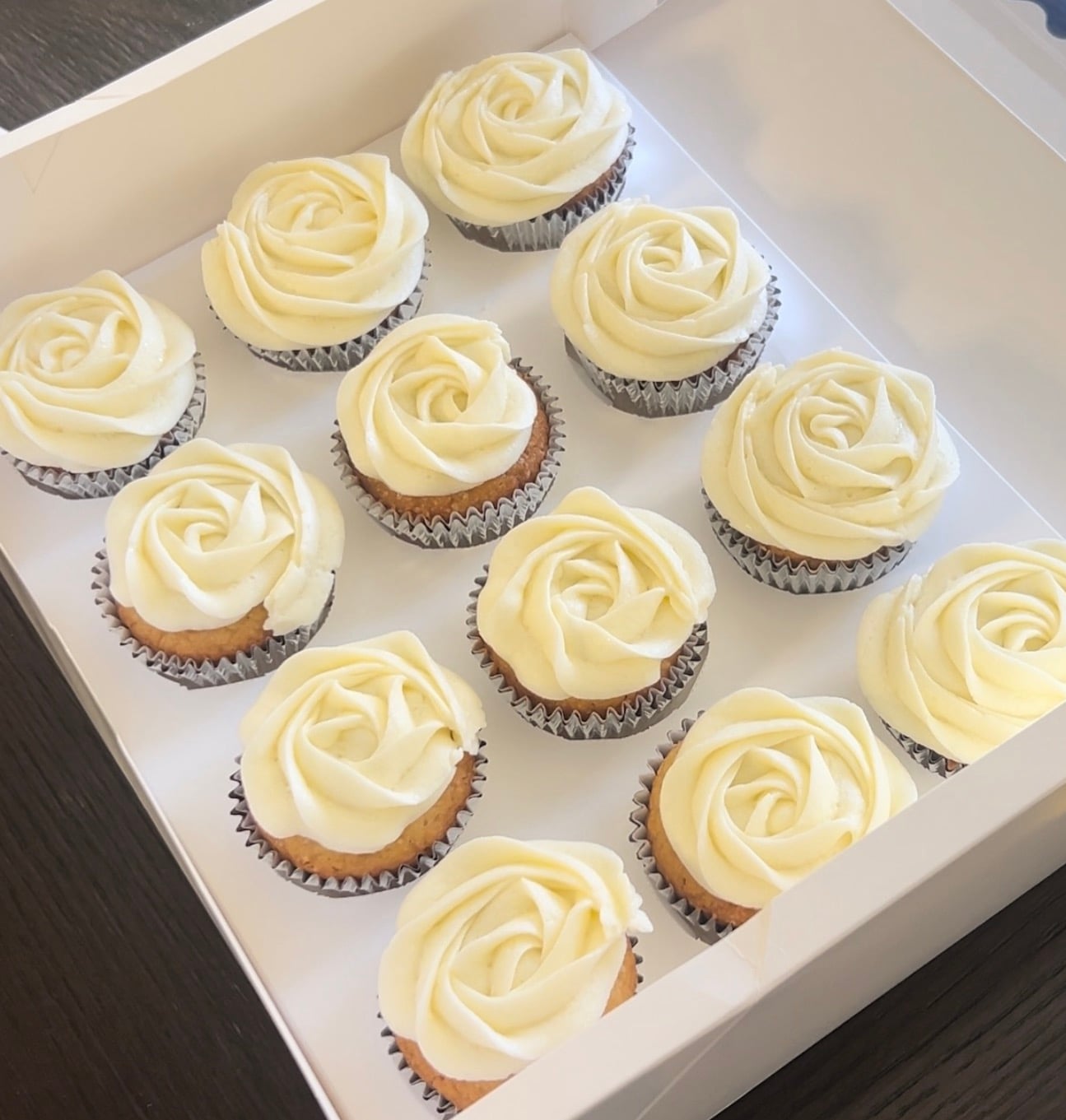 white vanilla cupcakes - custom eggless gallery cake by Cakes by Ashni
